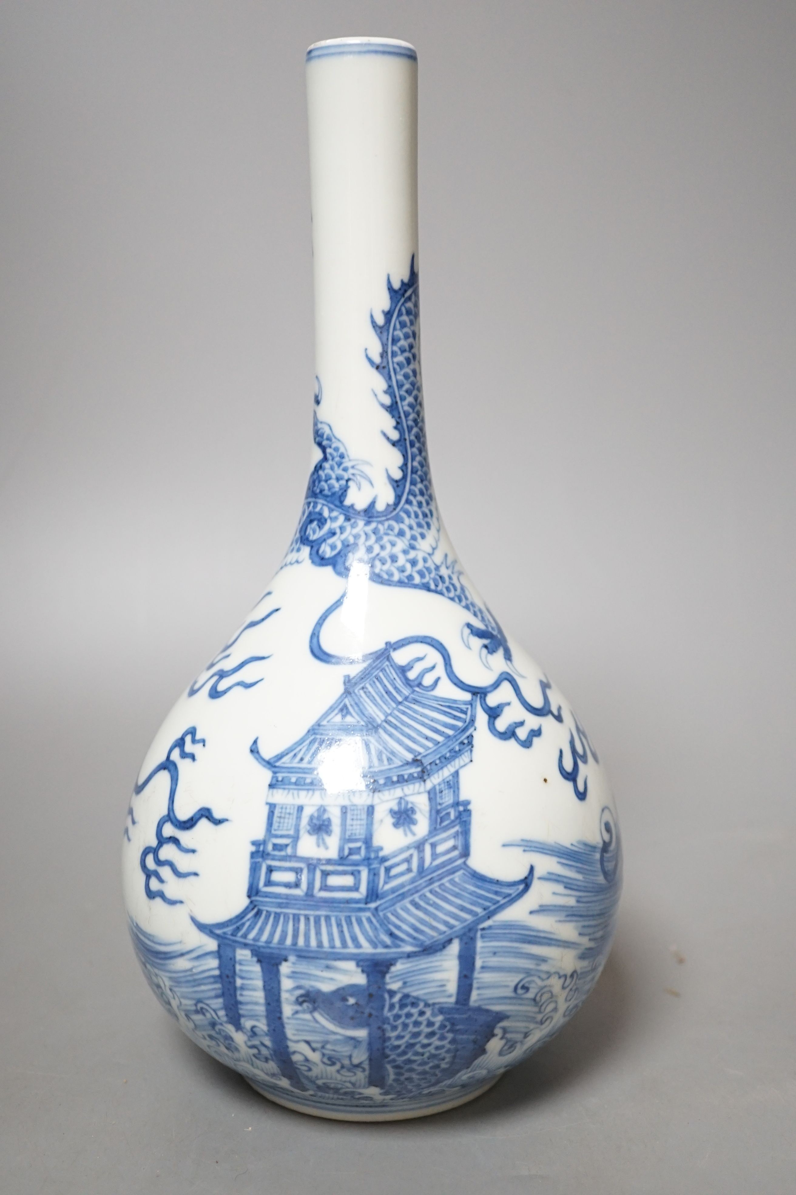 A Chinese blue and white ‘dragon’ bottle vase, 25cm